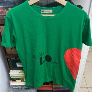 Green T-Shirt with Red Half Heart Design